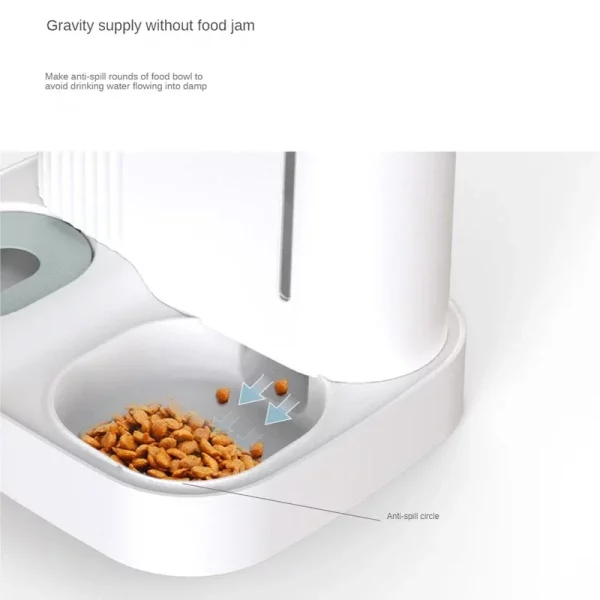 A small dog drinking water from the automatic pet feeder's water bowl.