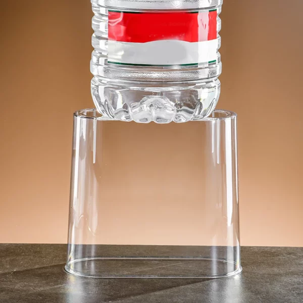 Clear plastic desktop aquarium bowl with lid, side view