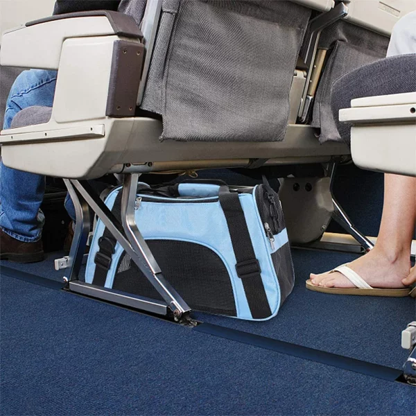 Pet carrier bag attached to a trolley case for travel convenience