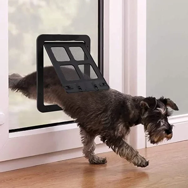 A dog or cat using the pet screen door to enter a home.