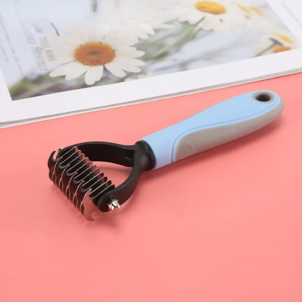 Dog grooming brush, detail of stainless steel teeth, effective for detangling