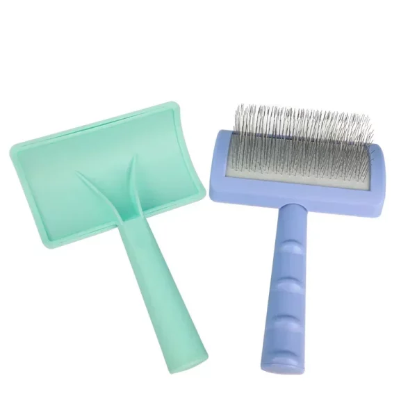 Pet grooming brush shown from the side, highlighting its compact and functional design.