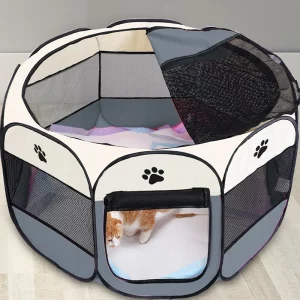 Portable dog cage, front view, set up for a small dog